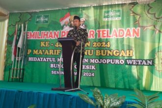 Ketua MWCNU Bungah KH Muhammad Alauddin, saat memberikan sambutan gelaran Pemilihan Pelajar Teladan LP Ma'arif MWCNU Bungah, Senin (20/5/2024). Foto: Azharur Rofiqi/NUGres